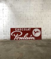 grande plaque publicitaire chocolat poulain metal 1972 5francs 1 172x198 - Ancienne grande plaque publicitaire Chocolat Poulain